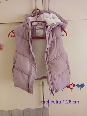 Sleeveless jacket like new, warm, very slim fit