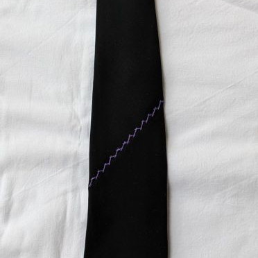 Dkny tie used polyester with lilac embroidery