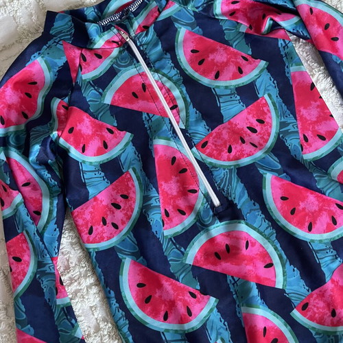 Girls' swimsuit with long sleeves like new, sun protection, size 7-8 years