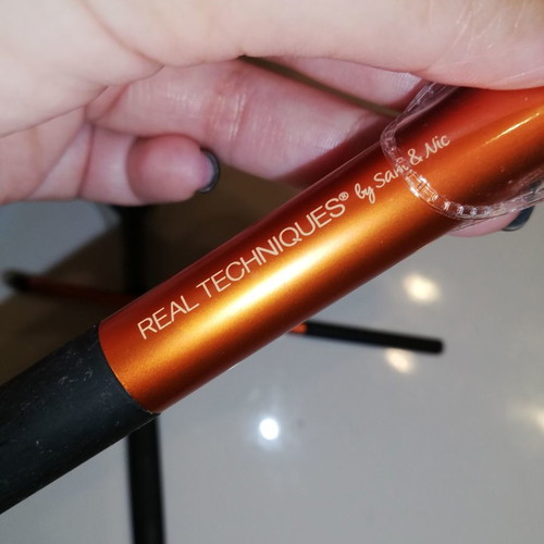 Real Techniques and Avon makeup brush set used