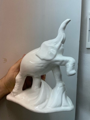 Elephant clay porcelain with yellow scratch on trunk