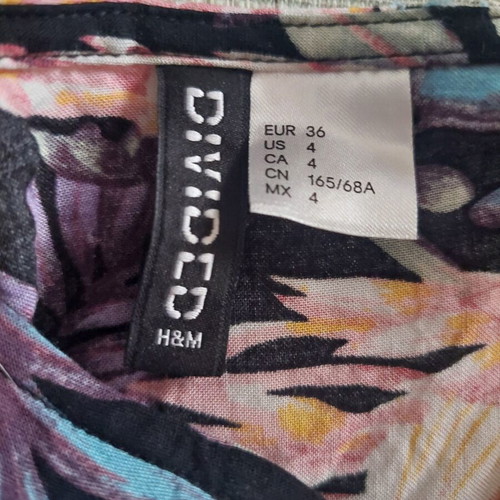 H&M jumpsuit shorts like new, tropical print, size S