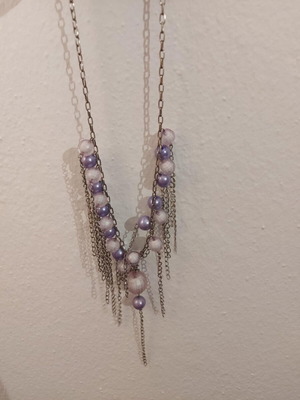 Necklace used with white and purple stones