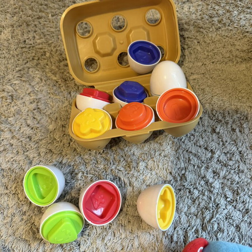 Baby toys set like new with shape matching eggs, house, and rattle gift