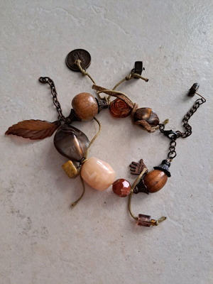 Boho bracelet used in brown and beige tones with details