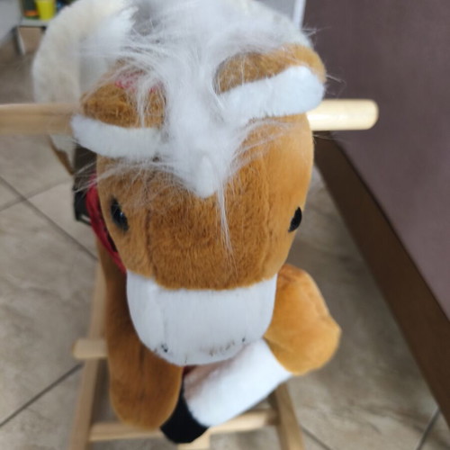 Rocking horse for children used with sounds