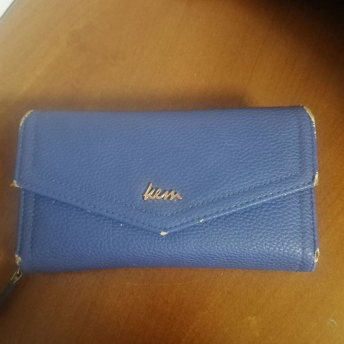 KEM wallet used, blue with multiple compartments