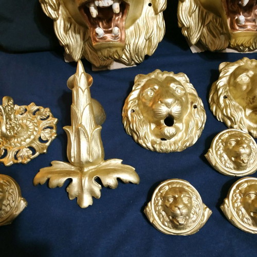 Decorative items used, cast iron lion heads, old antiques