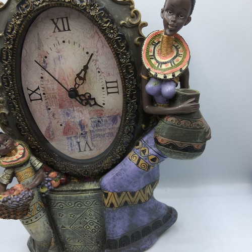 Table clock with African figures decoration, like new