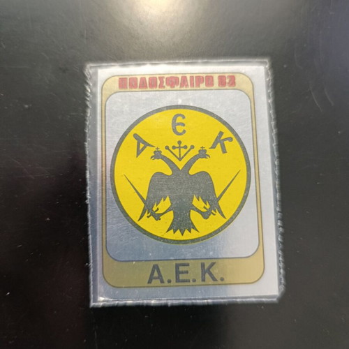 Panini Football 83 silver AEK emblem sticker #1