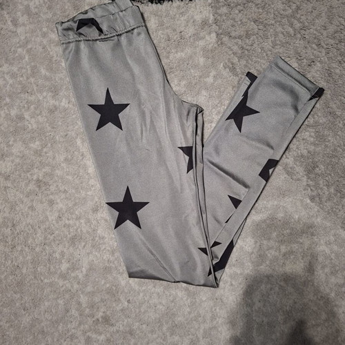 Hyper women's silver leggings with black stars, one size