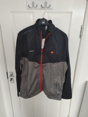 Ellesse Golf Sandi αδιάβροχο μπουφάν καινούργιο με ετικέτες, μέγεθος L, μαύρο και γκρι
