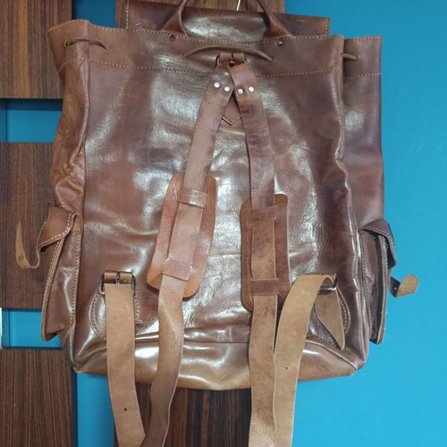 Vintage leather backpack like new, brown with three pockets