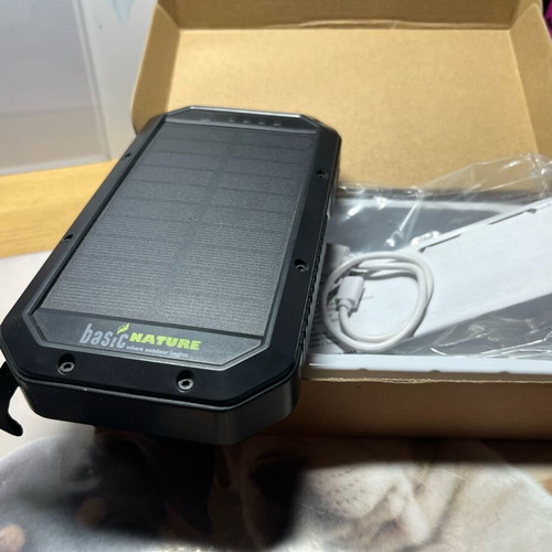 Solar Powerbank BasicNature 20,000mAh like new with wireless charging and LED flashlight