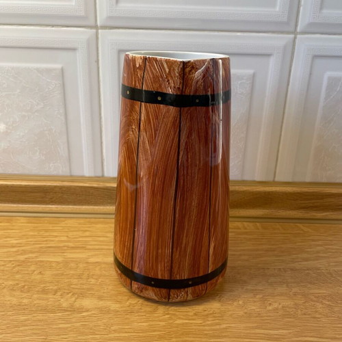 Vintage ceramic pitcher like new with wooden barrel design