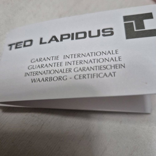 Ted Lapidus women's watch new with white leather strap