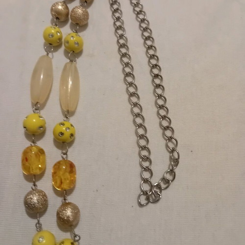 Necklace with beads in various shapes and metal chain like new