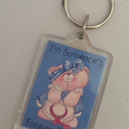 Forever Friends keychain with pink teddy bear and blue outfit