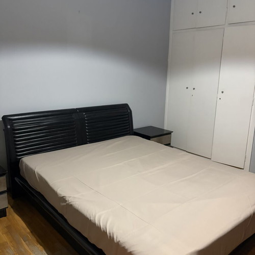 Bedroom furniture set used, includes bed, mattress, storage, nightstands, vanity, mirror
