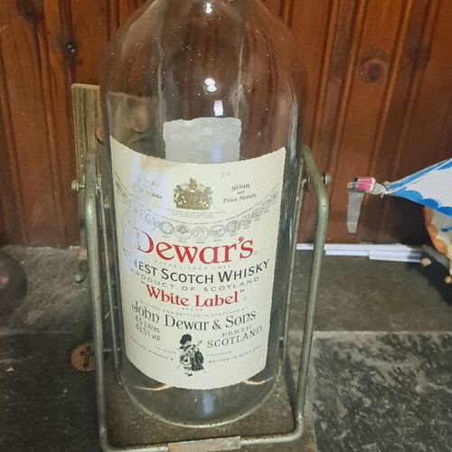 Dewar's White Label whisky used large 4.5L bottle with metal cradle vintage