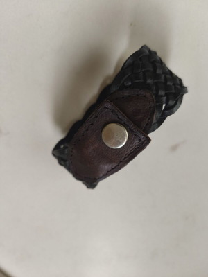 Leather bracelet used, black with brown details, sturdy weave