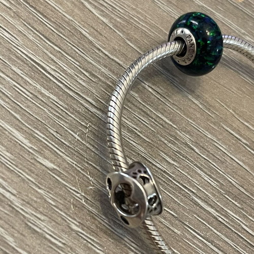 Pandora bracelet 925 silver with gold-plated clasp and two charms, used, 17 cm