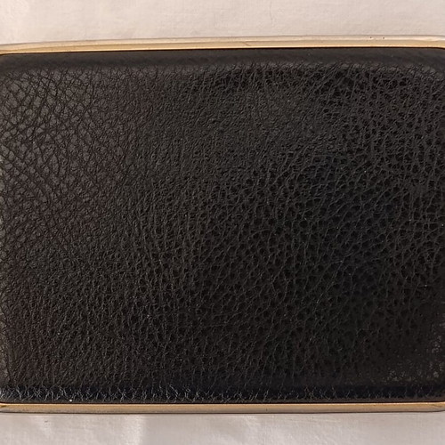 Classic cigarette case used, black leatherette with bronze interior