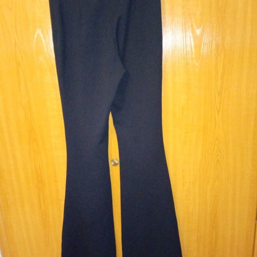 Pink Woman flared pants size S like new, black with silver studs