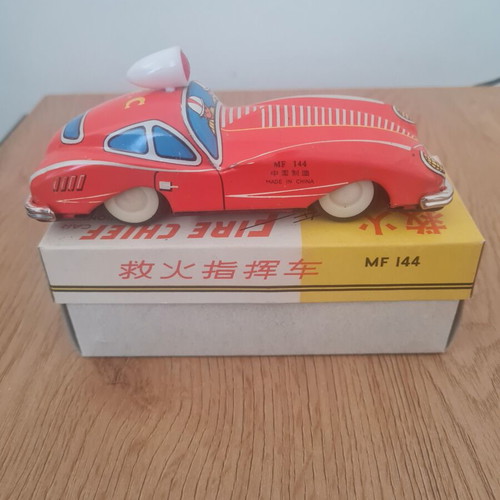 MF144 Fire Chief tin car like new, rare vintage toy