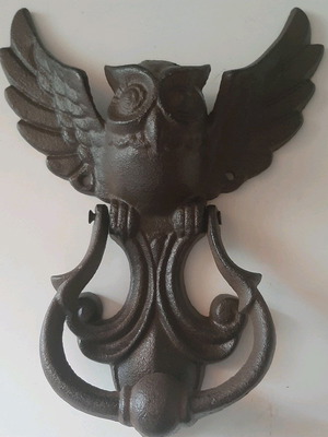 Vintage door knocker made of cast iron new