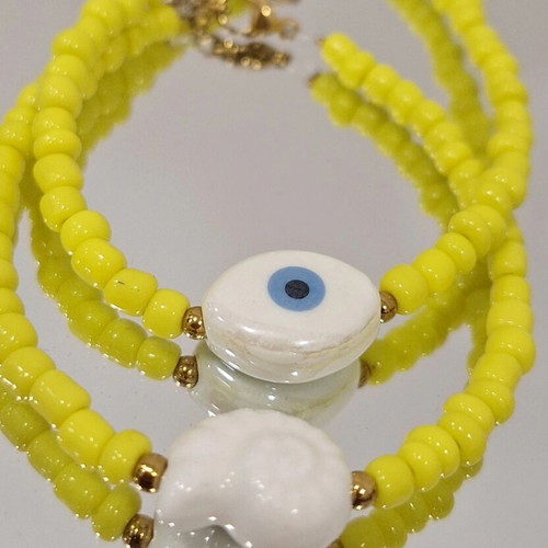 Handmade bracelet with ceramic eye and shell made to order
