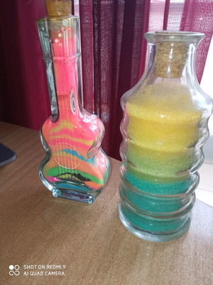 Glass decorative containers with artistic details