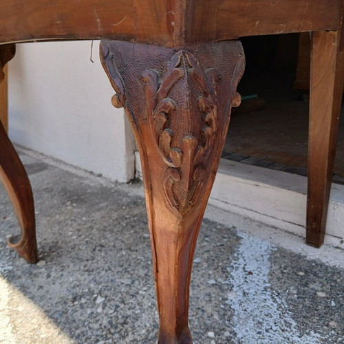 Dining set used, solid wood with carved designs and leather chairs
