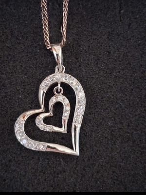 Silver necklace with double heart pendant like new