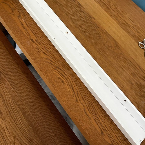 White shelf for frames used, from IKEA, 115cm x 9cm