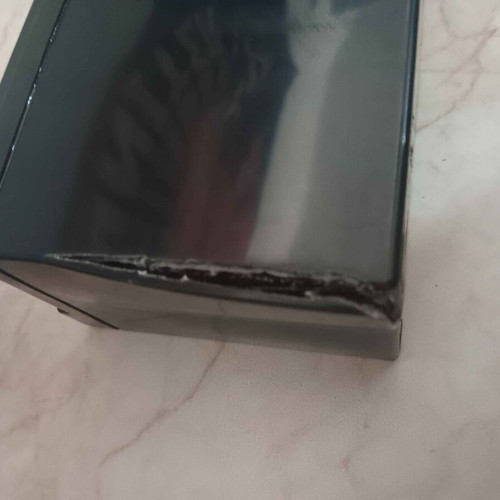 2 UPS batteries 12V 7Ah, one with edge damage