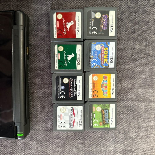 Nintendo DSLite used with 8 games and case