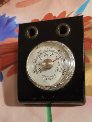Vintage wooden desk set with thermometer and pen holders used