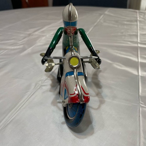 Motorcyclist old tin toy like new