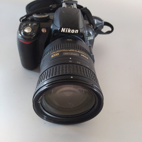 Nikon D3100 DSLR camera used with AF-S DX Nikkor 18-200mm f/3.5-5.6G ED VR lens
