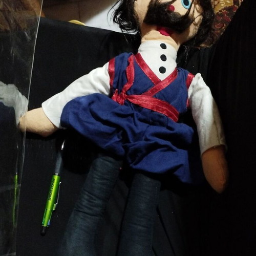 Cloth souvenir doll of Cretan with traditional costume like new