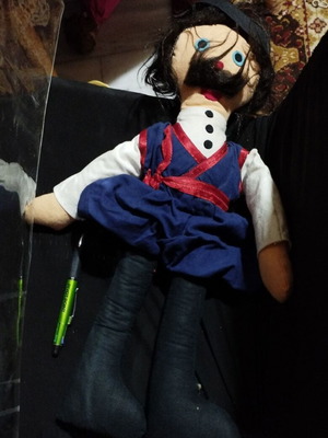 Cloth souvenir doll of Cretan with traditional costume like new