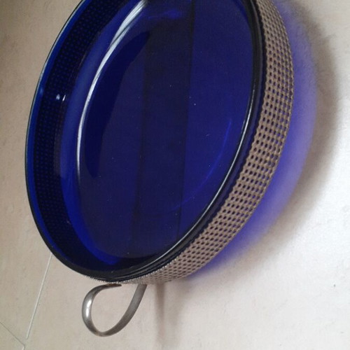 Vintage cobalt blue glass decorative bowl with metal base