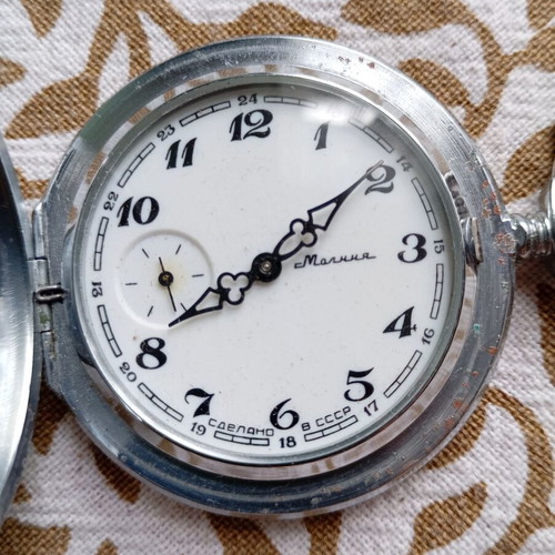 Vintage Molnija pocket watch used, Soviet mechanical hand-winding with embossed design
