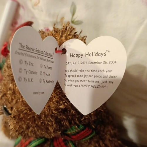 Ty Beanie Babies set of 2 new collectibles Phil and Happy Holidays