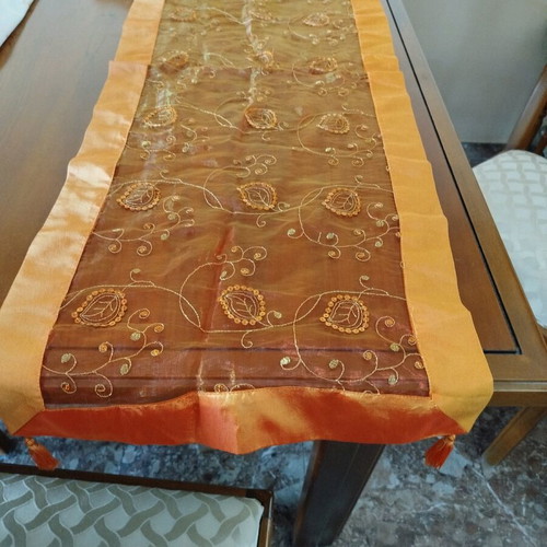 Embroideries used, runner and squares with orange tassels
