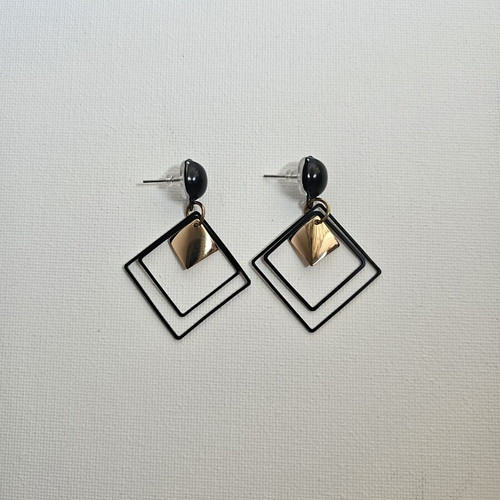 Geometric dangle earrings like new, black and gold