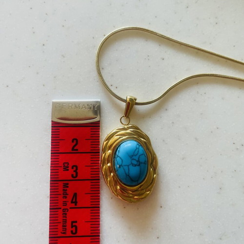 Necklace made of stainless steel like new, turquoise and gold tone