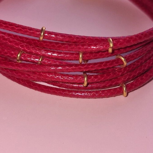 Bracelet like new red with blue bead on clasp