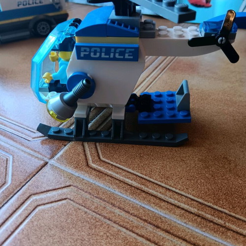 Lego set used with truck, helicopter, and motorcycle
